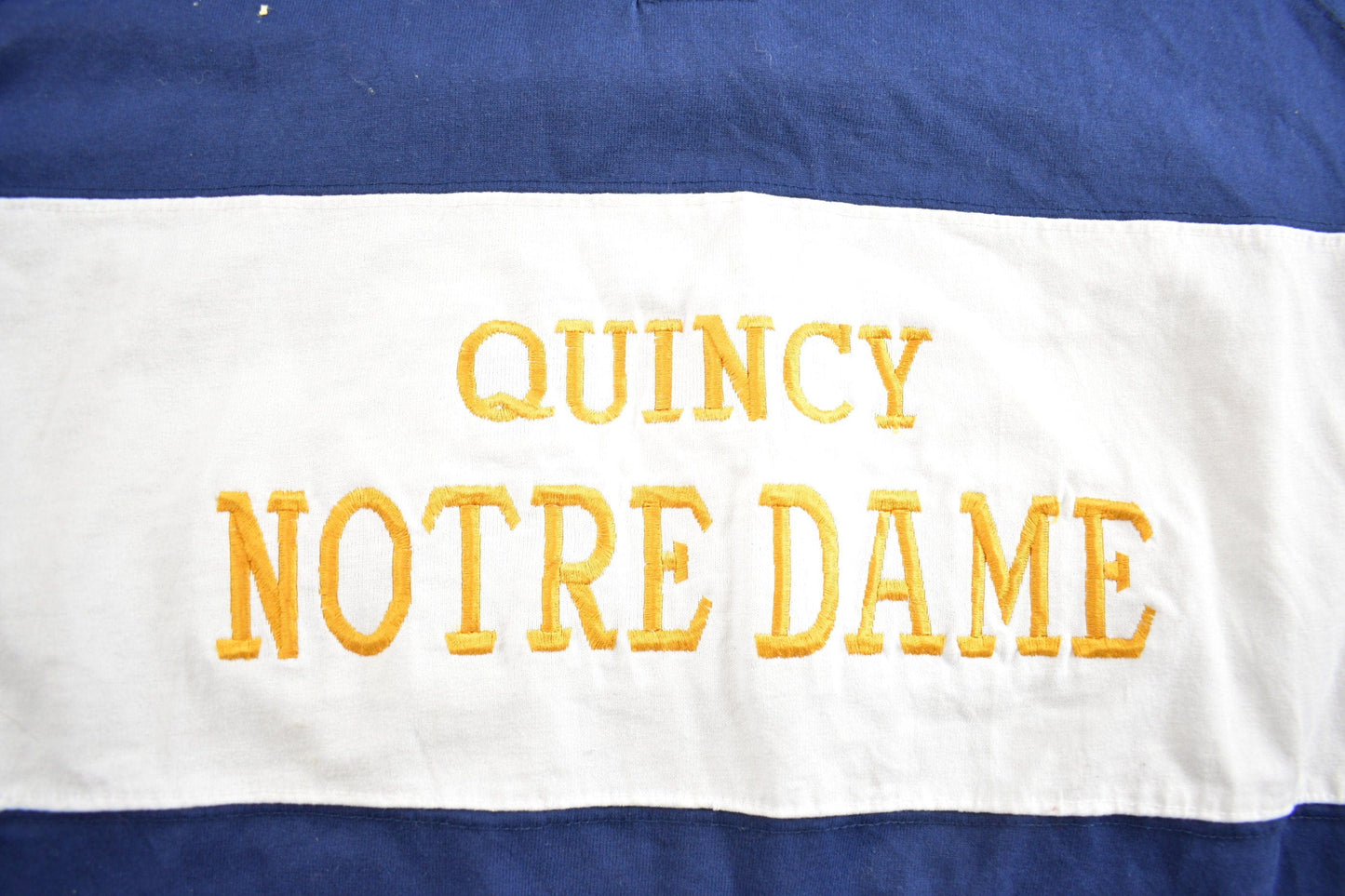 Vintage 1980s Quincy Notre Dame Raiders Collegiate Rugby Shirt Men's S from propervintagecanada