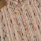 Vintage 1980s Ruffle Collar Button Up Shirt Men's Small from propervintagecanada