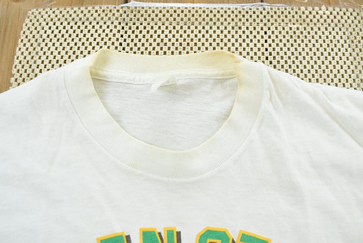 Vintage 1980s Salem Boston Celtics NBA Big Head Cartoon T-Shirt Men's S from propervintagecanada
