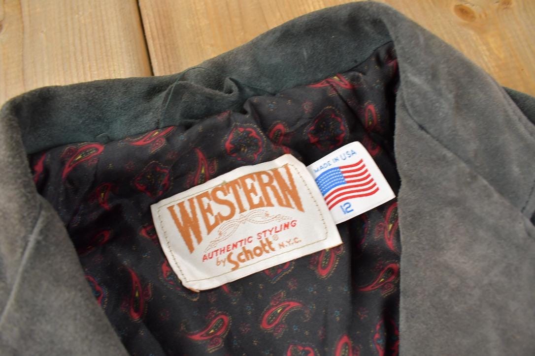 Vintage 1980s Schott Western Wear Fringe Leather Jacket Women's XL from propervintagecanada