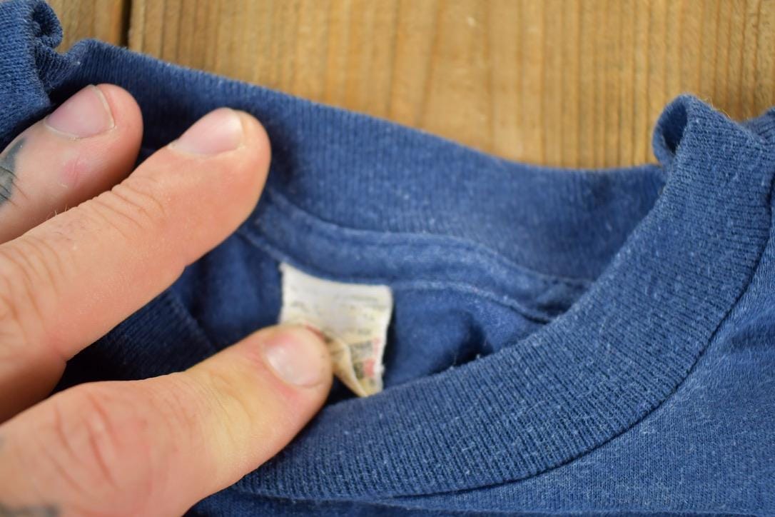 Vintage 1980s Screen Stars Best Aztec Canoe Souvenir Single Stitch Graphic Print T-Shirt Men's Large from propervintagecanada