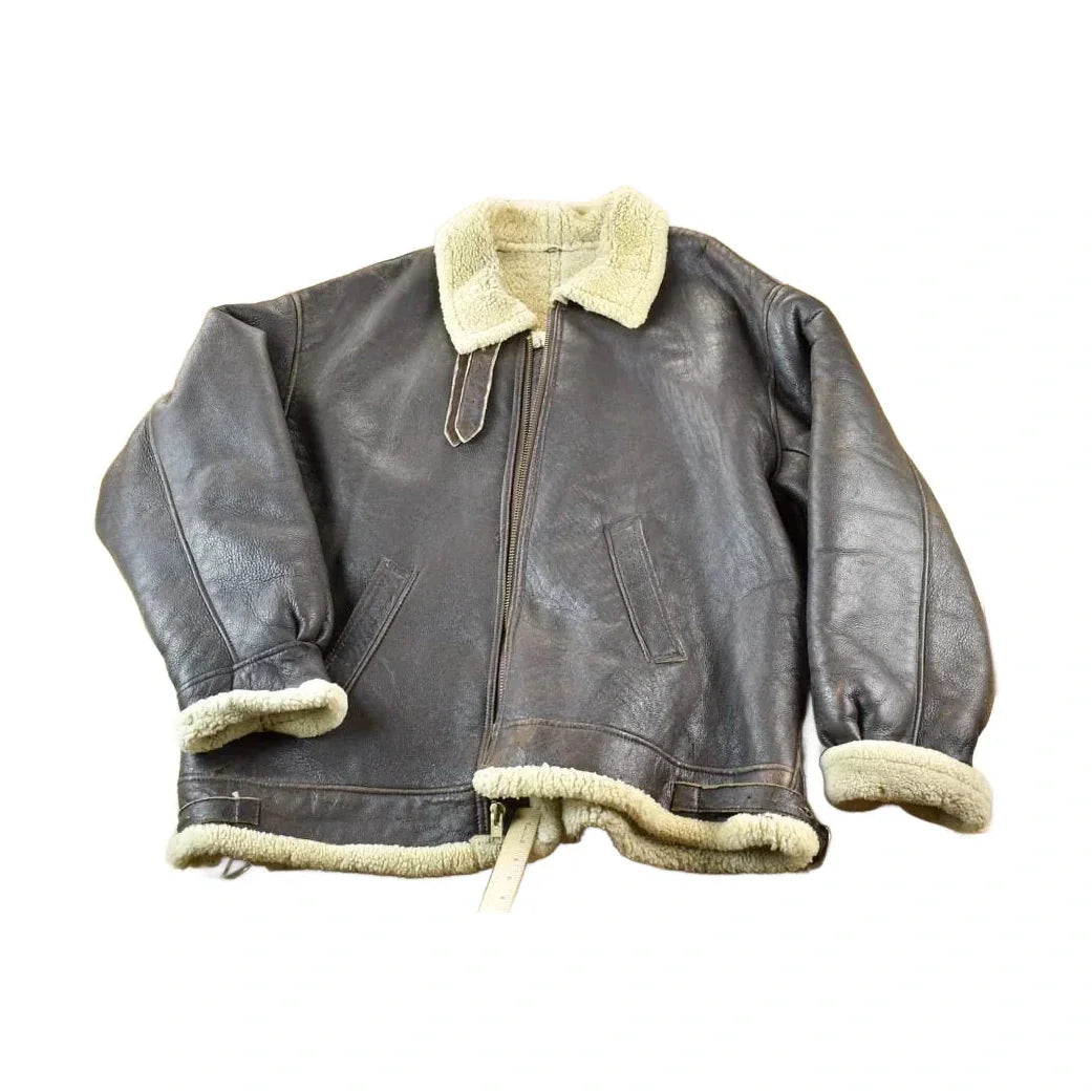 Vintage 1980s Shearling Bomber Jacket Real Leather and Wool from propervintagecanada