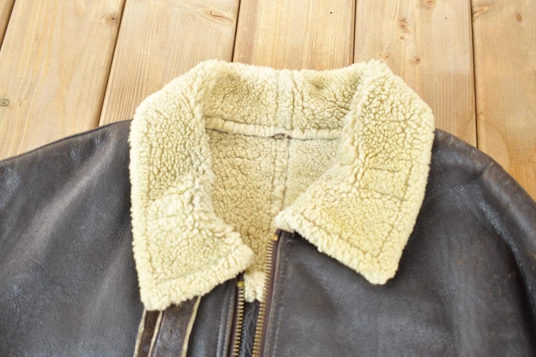 Vintage 1980s Shearling Bomber Jacket Real Leather and Wool from propervintagecanada
