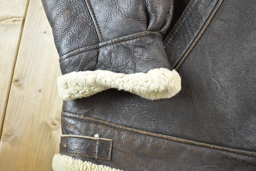 Vintage 1980s Shearling Bomber Jacket Real Leather and Wool from propervintagecanada