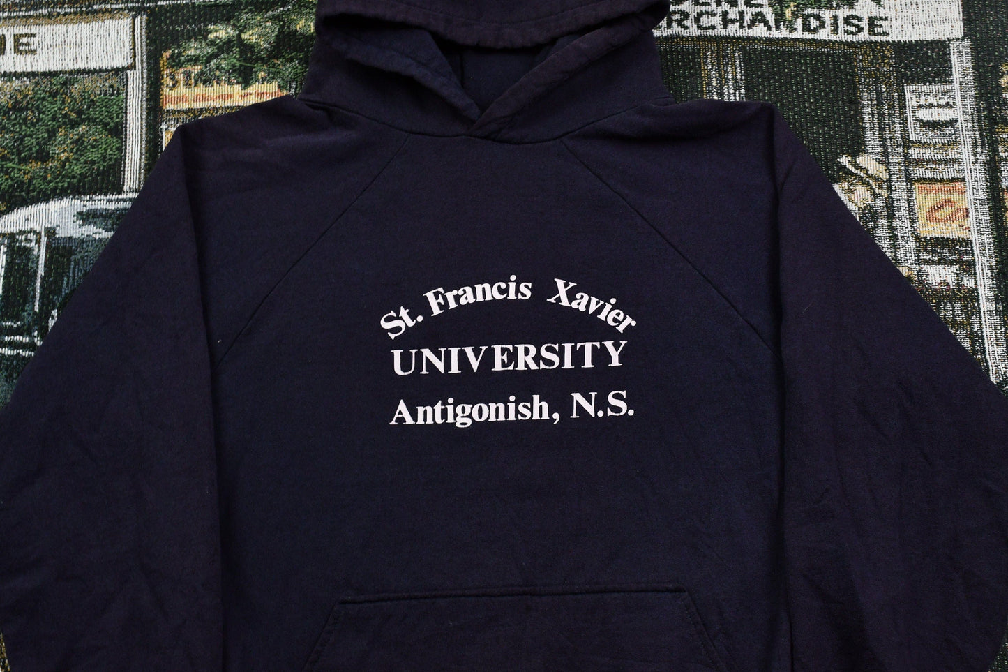 Vintage 1980s St Francis Xavier University Graphic Raglan Hoodie Men's S from propervintagecanada