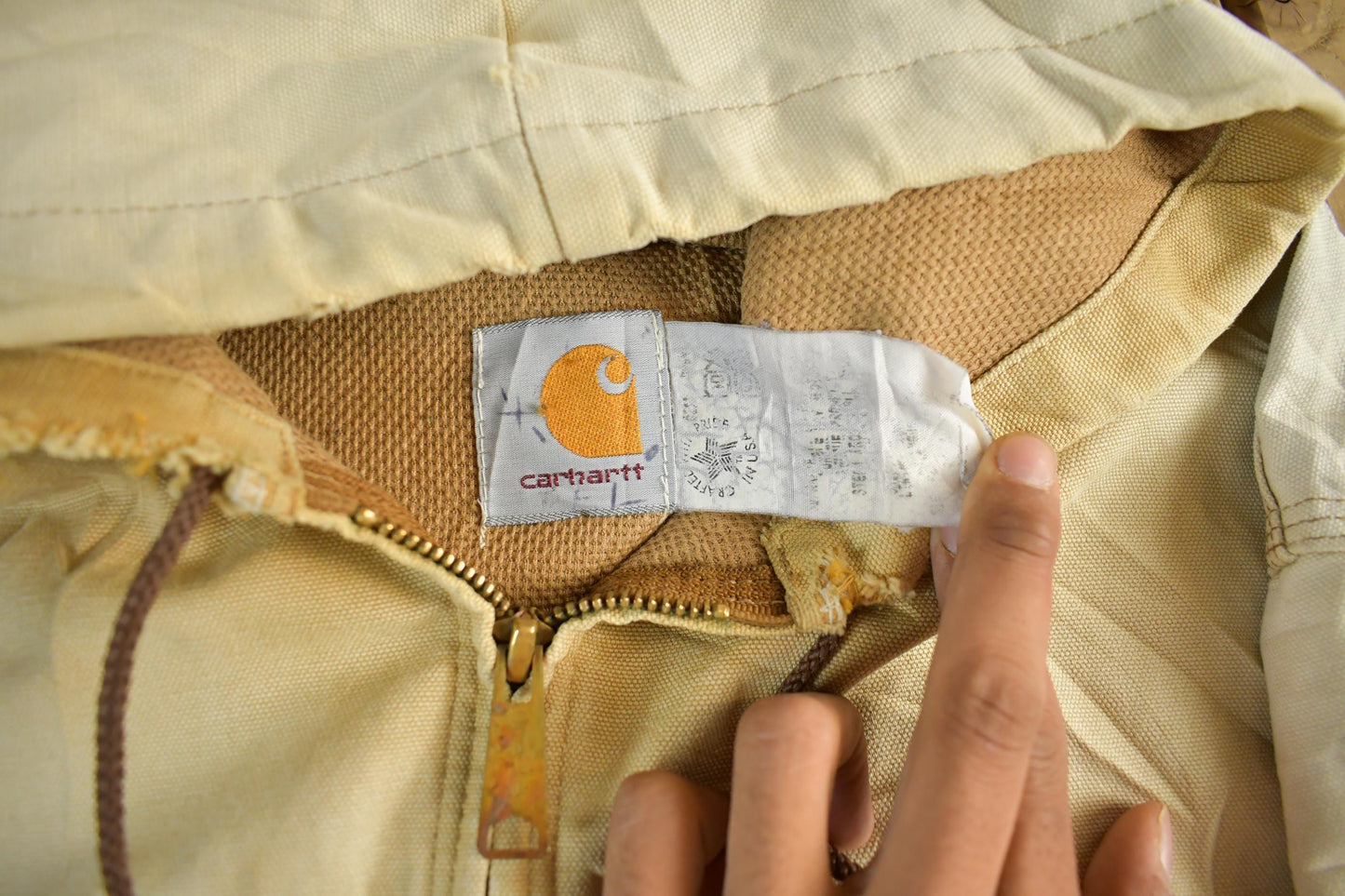 Vintage 1980s Sun Faded Carhartt Canvas Hooded Jacket Men's XL from propervintagecanada
