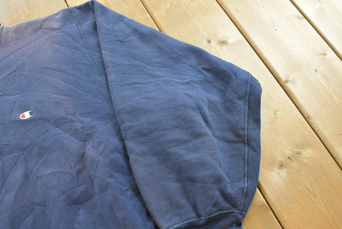 Vintage 1980s Sun Faded Champion Blank Blue Reverse Weave Warm Up Sweatshirt Men's L / Made in USA / 80s Streetwear from propervintagecanada
