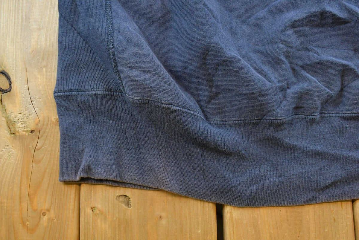 Vintage 1980s Sun Faded Champion Blank Blue Reverse Weave Warm Up Sweatshirt Men's L / Made in USA / 80s Streetwear from propervintagecanada