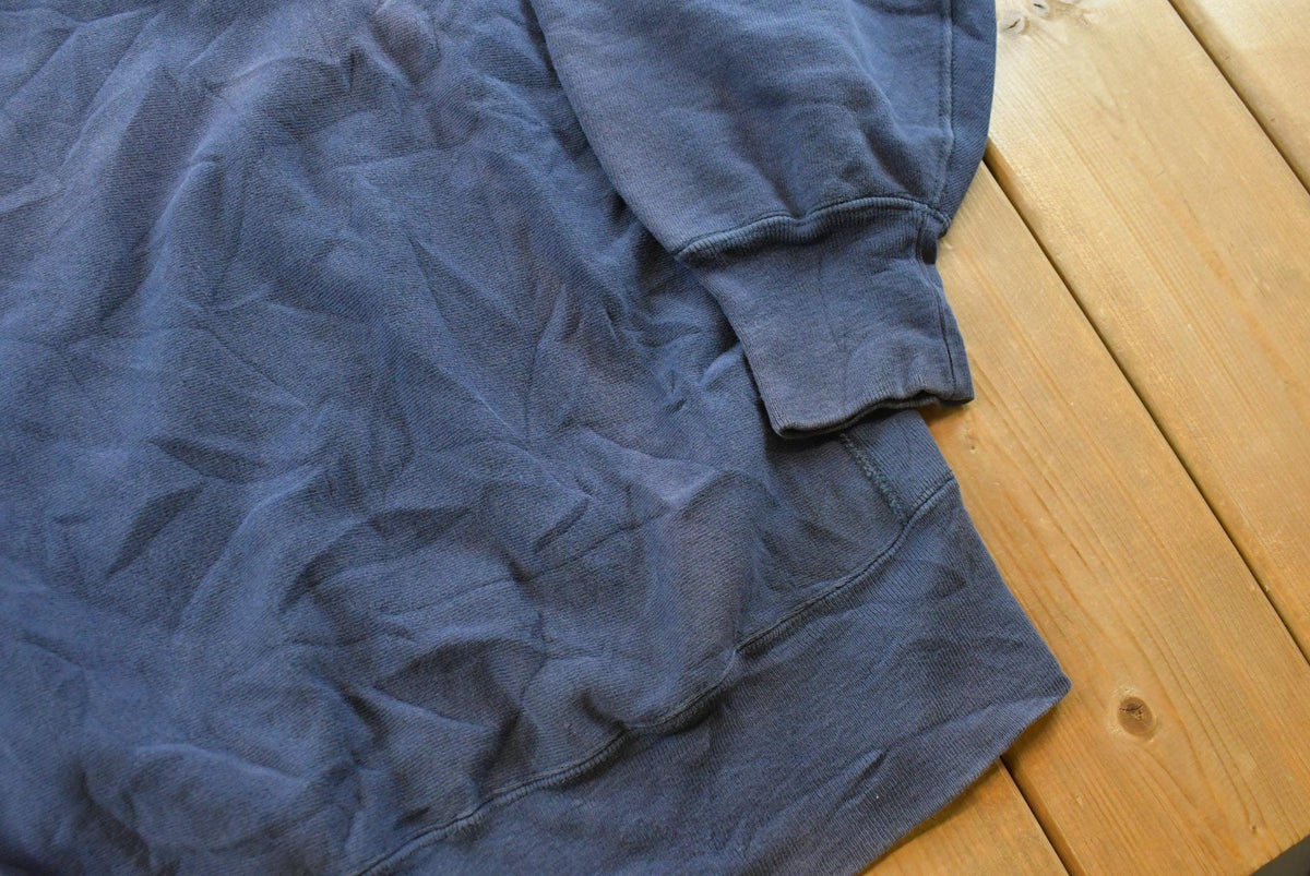 Vintage 1980s Sun Faded Champion Blank Blue Reverse Weave Warm Up Sweatshirt Men's L / Made in USA / 80s Streetwear from propervintagecanada