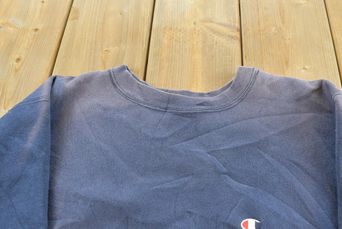 Vintage 1980s Sun Faded Champion Blank Blue Reverse Weave Warm Up Sweatshirt Men's L / Made in USA / 80s Streetwear from propervintagecanada