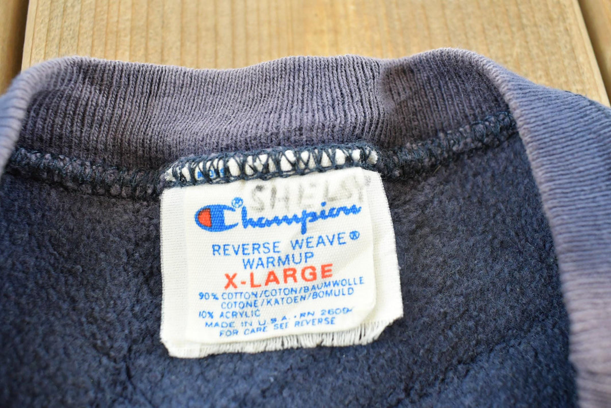 Vintage 1980s Sun Faded Champion Blank Blue Reverse Weave Warm Up Sweatshirt Men's L / Made in USA / 80s Streetwear from propervintagecanada