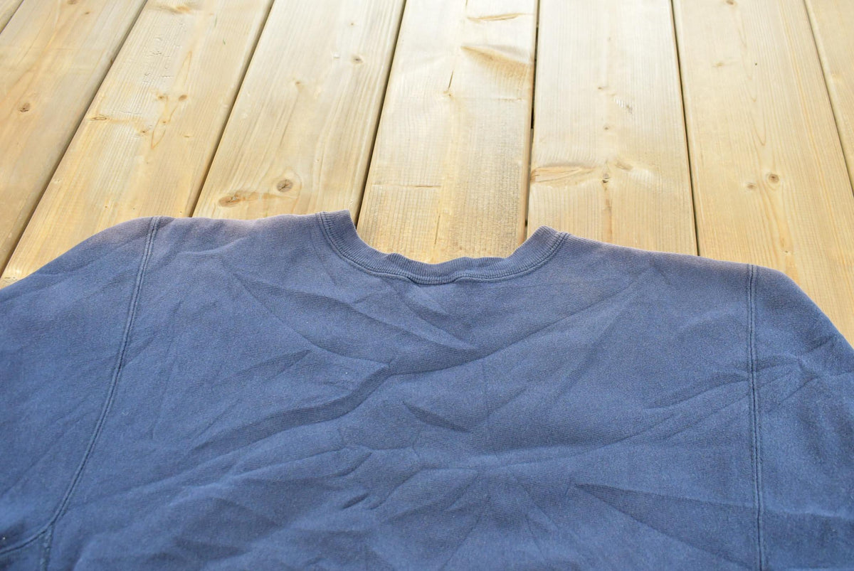 Vintage 1980s Sun Faded Champion Blank Blue Reverse Weave Warm Up Sweatshirt Men's L / Made in USA / 80s Streetwear from propervintagecanada