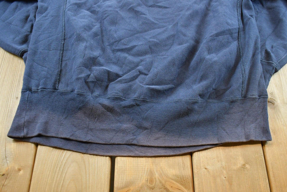Vintage 1980s Sun Faded Champion Blank Blue Reverse Weave Warm Up Sweatshirt Men's L / Made in USA / 80s Streetwear from propervintagecanada