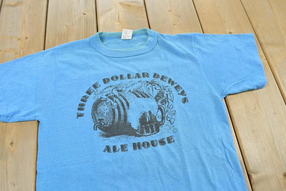 Vintage 1980s Three Dollar Deweys Ale House Souvenir T-Shirt Made In USA Mens XS from propervintagecanada
