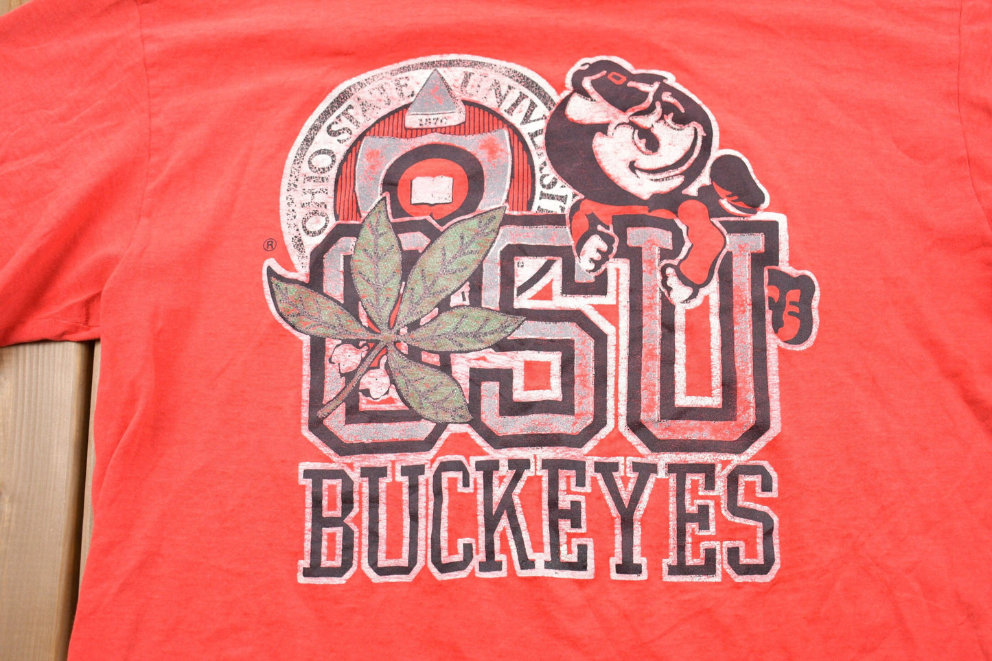 Vintage 1980s University of Ohio State Buckeyes Graphic Collegiate T-Shirt Men's XL from propervintagecanada