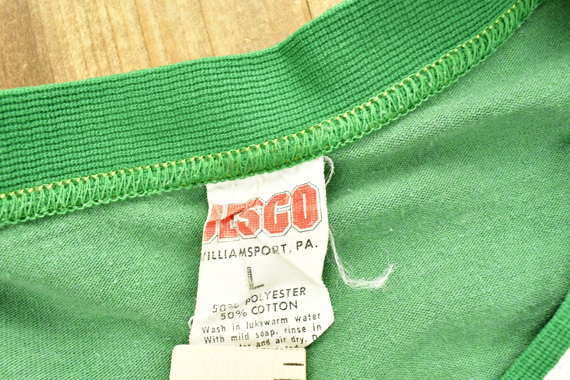 Vintage 1980s University of Quaker State Collegiate Ringer T-Shirt Men's Medium from propervintagecanada