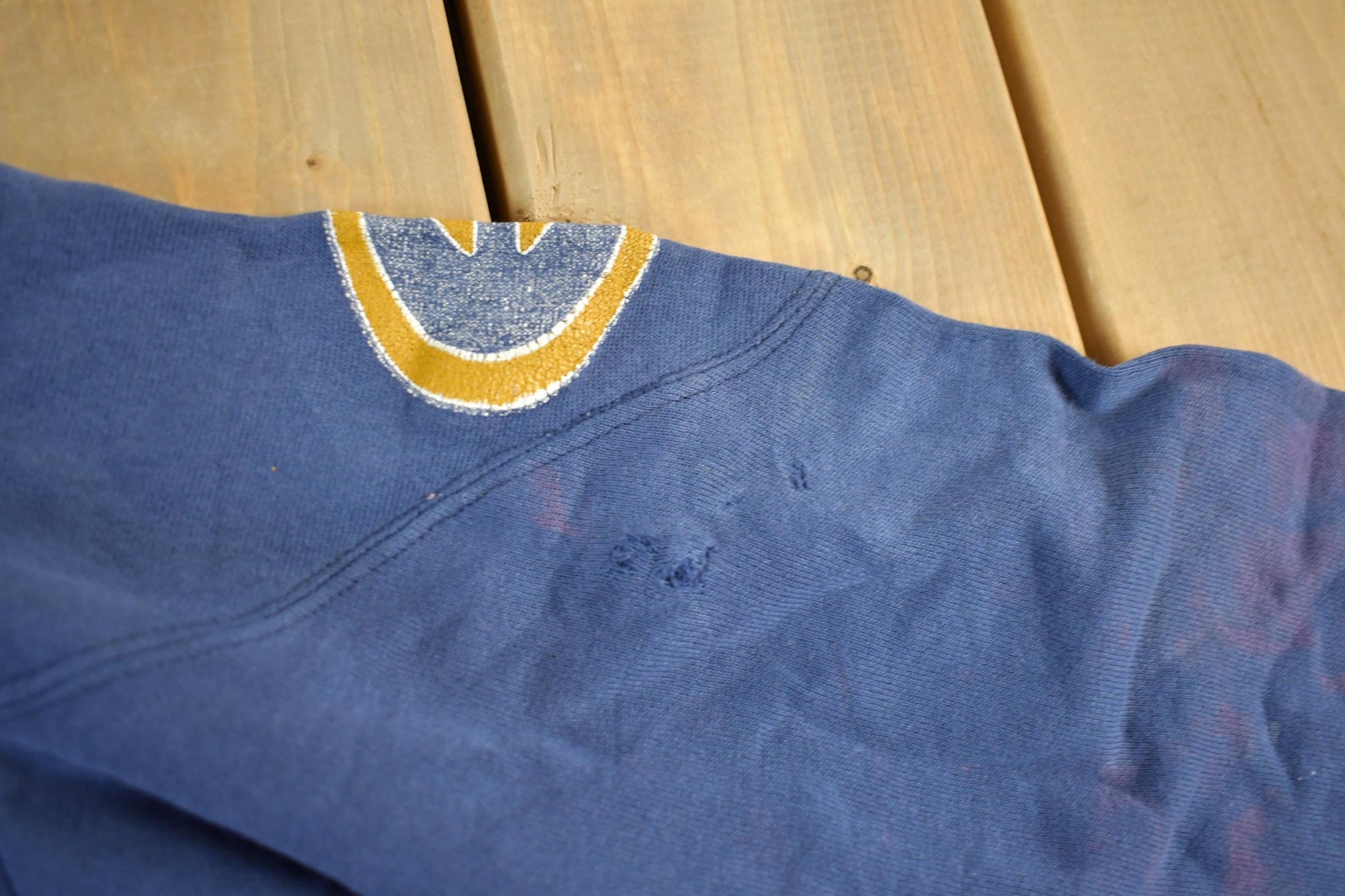 Vintage 1980s University Of Wisconsin UW EAU Claire Distressed Crewneck Men's Medium from propervintagecanada