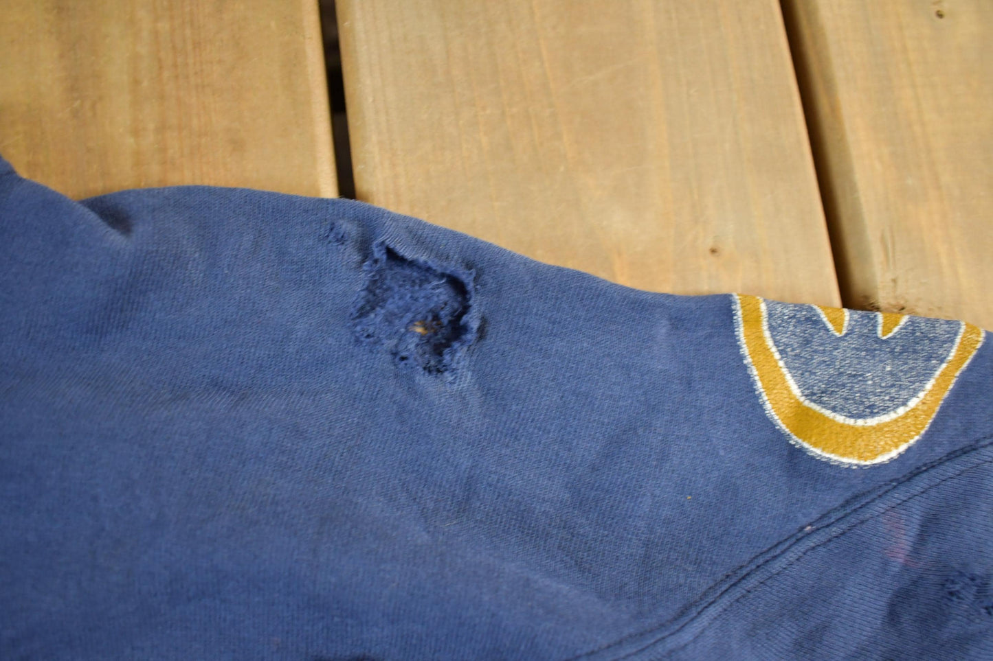 Vintage 1980s University Of Wisconsin UW EAU Claire Distressed Crewneck Men's Medium from propervintagecanada