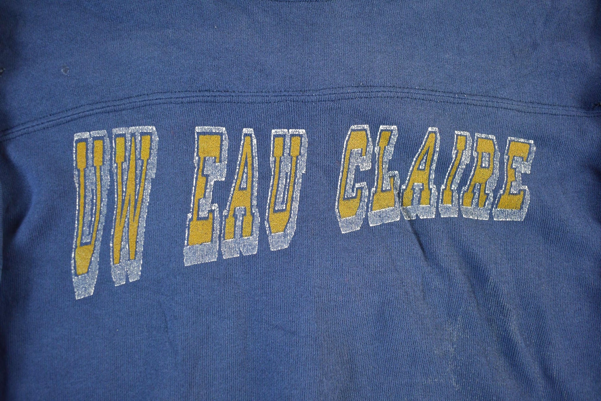 Vintage 1980s University Of Wisconsin UW EAU Claire Distressed Crewneck Men's Medium from propervintagecanada