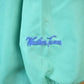 Vintage 1980s Weather Tamer Bright Striped Windbreaker from propervintagecanada