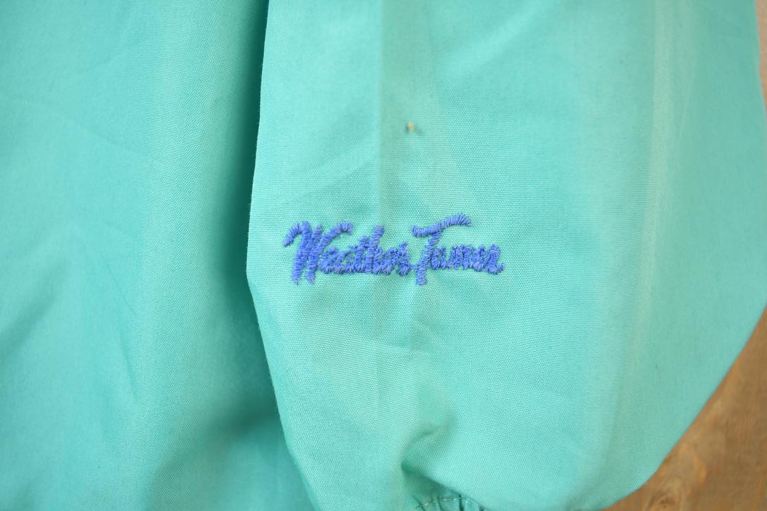 Vintage 1980s Weather Tamer Bright Striped Windbreaker from propervintagecanada