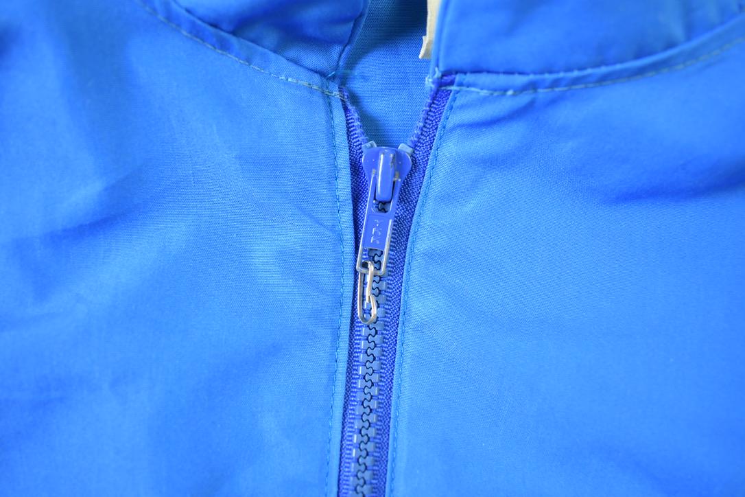 Vintage 1980s Weather Tamer Bright Striped Windbreaker from propervintagecanada