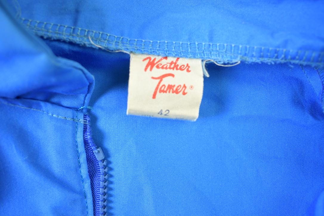 Vintage 1980s Weather Tamer Bright Striped Windbreaker from propervintagecanada