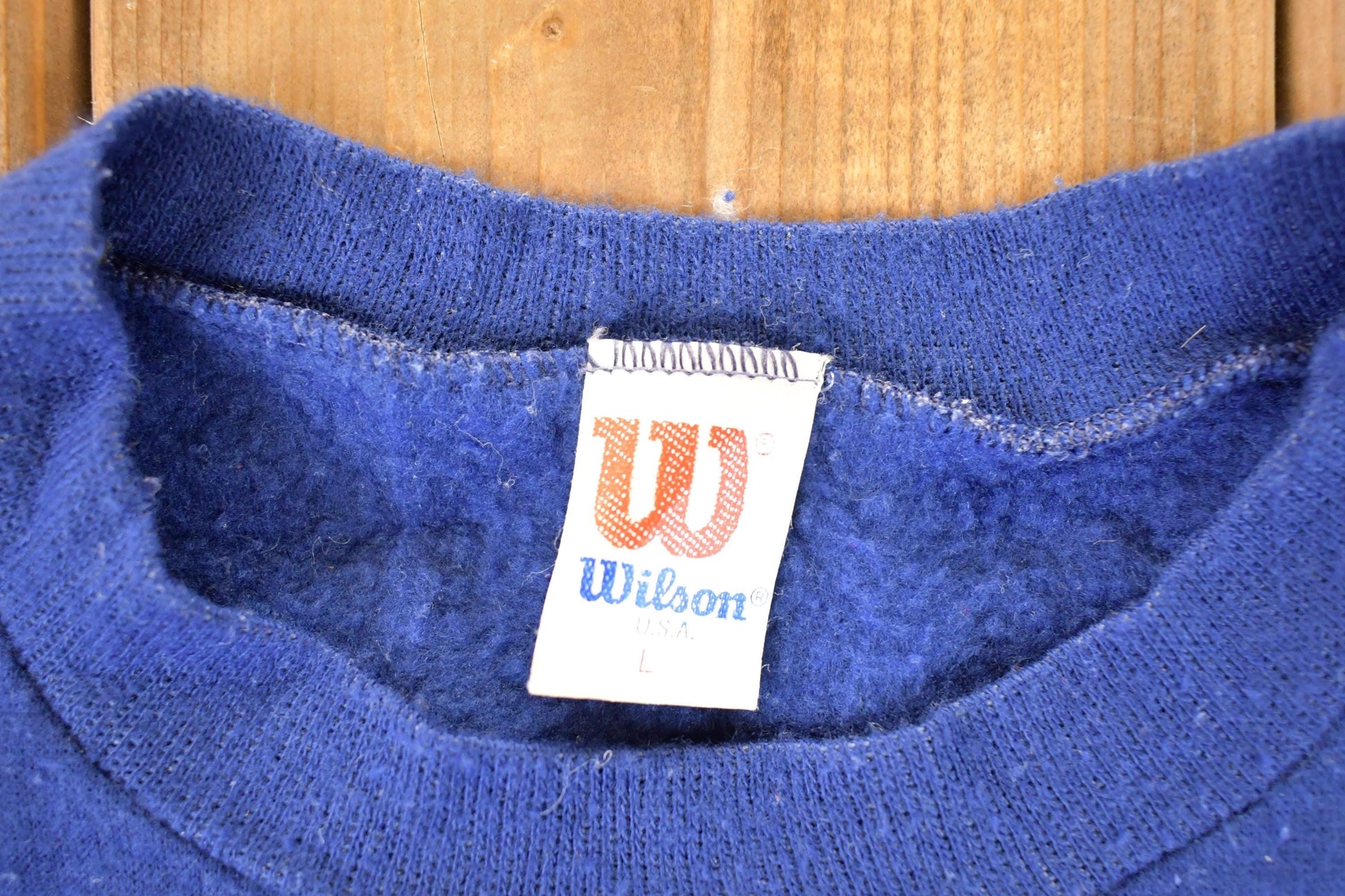 Vintage 1980s Wilson Crewneck Sweatshirt Youth L from propervintagecanada