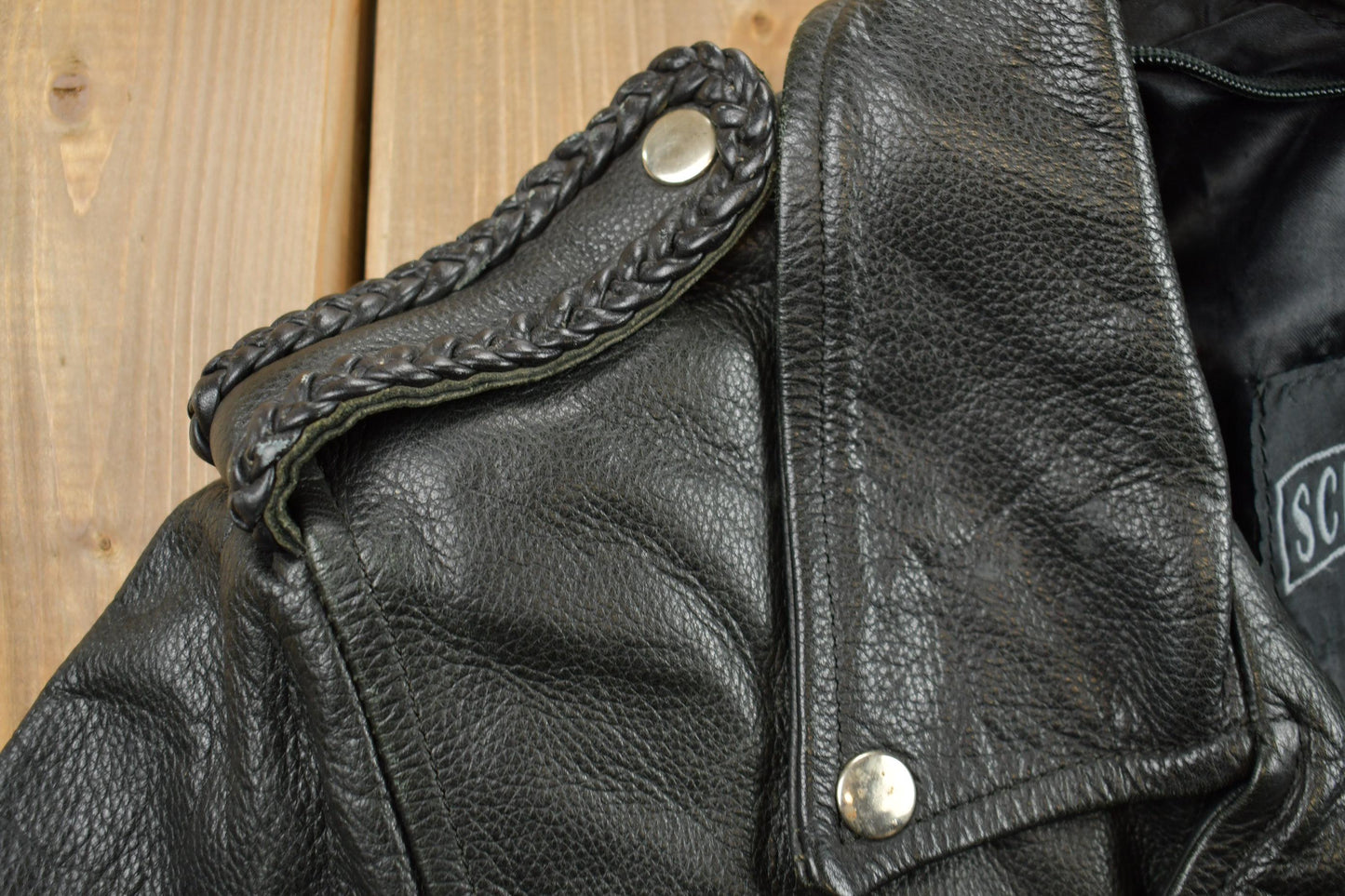 Vintage 1980s Womens Leather Braid Stud Biker Jacket from propervintagecanada