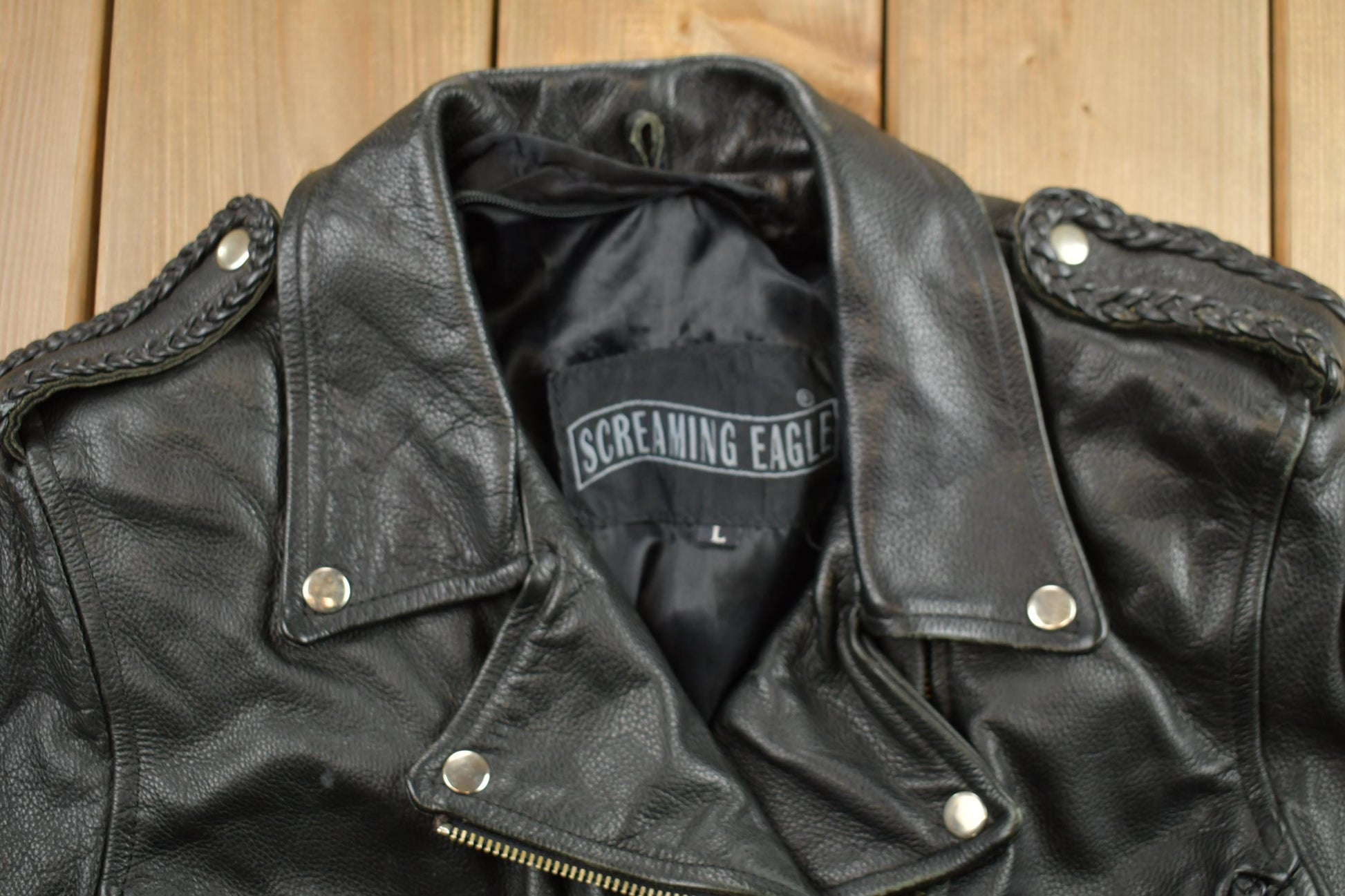 Vintage 1980s Womens Leather Braid Stud Biker Jacket from propervintagecanada