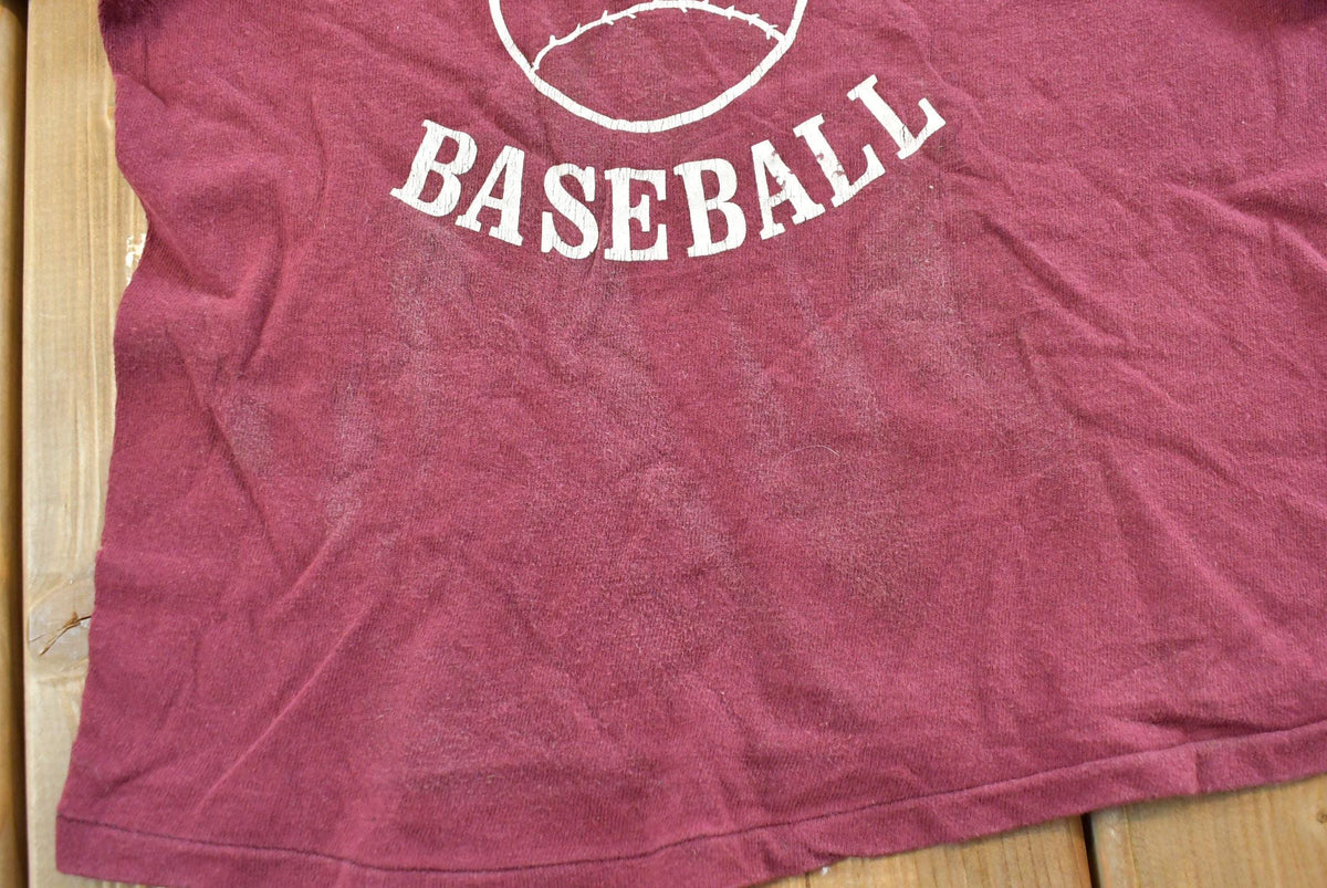 Vintage 1980s Youth Russell Athletic Gwyn Noir Baseball T-Shirt Youth S from propervintagecanada