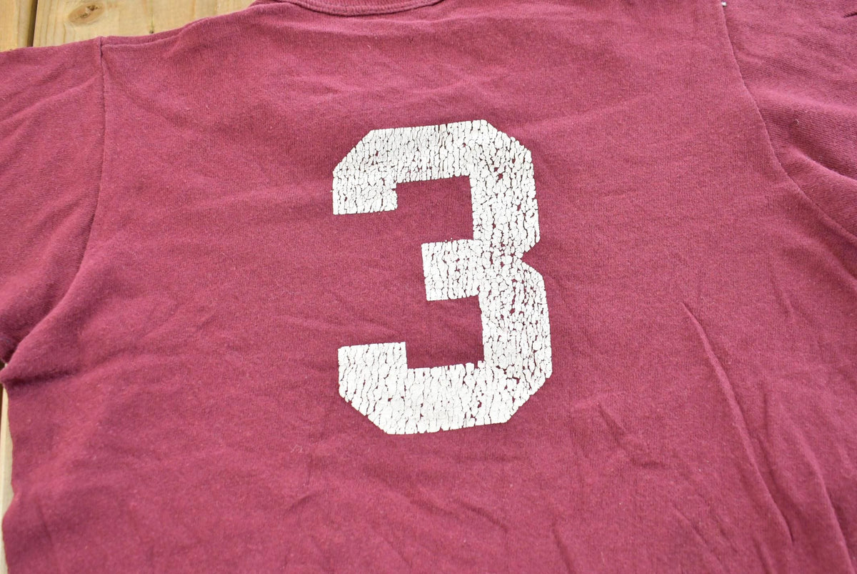 Vintage 1980s Youth Russell Athletic Gwyn Noir Baseball T-Shirt Youth S from propervintagecanada