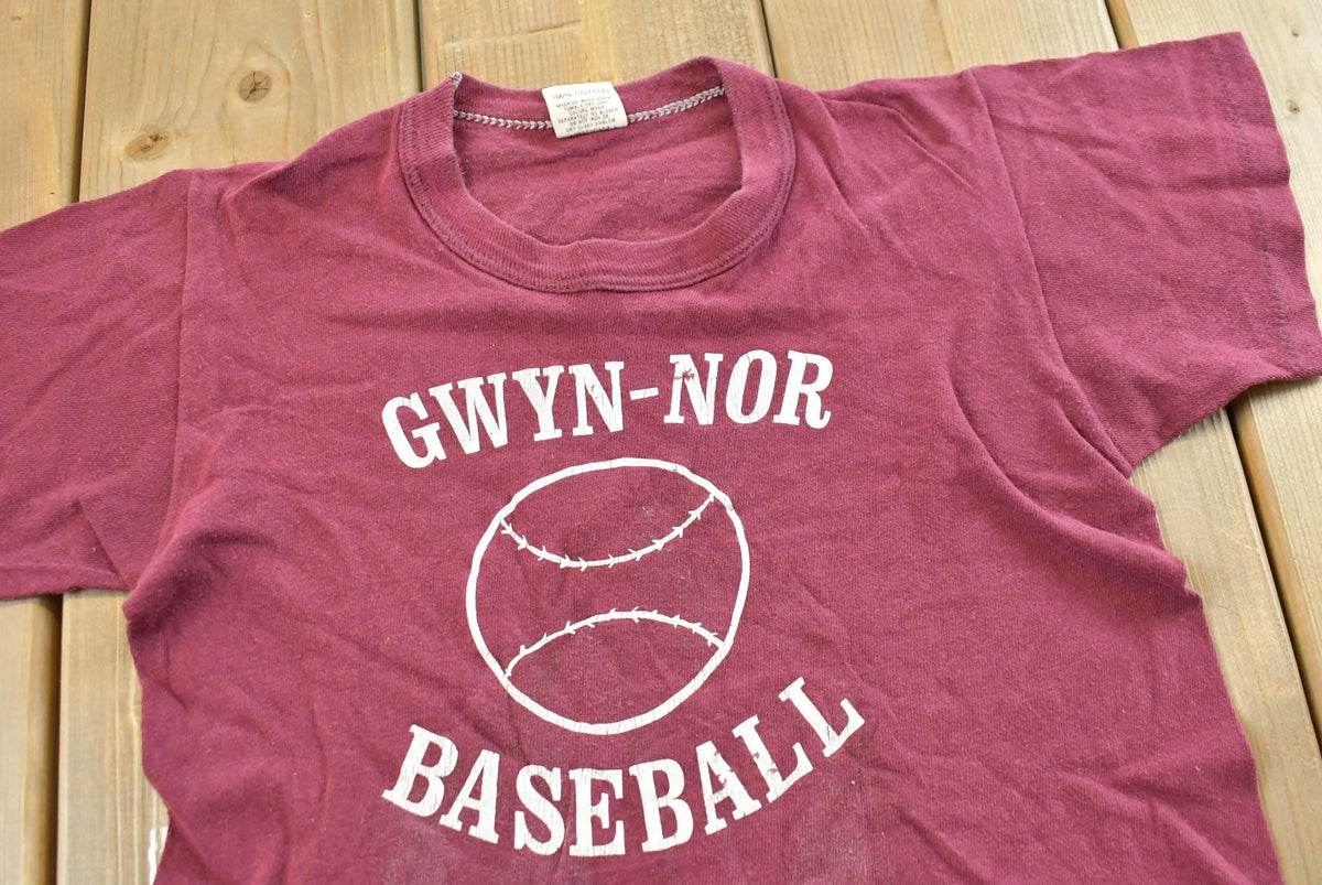 Vintage 1980s Youth Russell Athletic Gwyn Noir Baseball T-Shirt Youth S from propervintagecanada