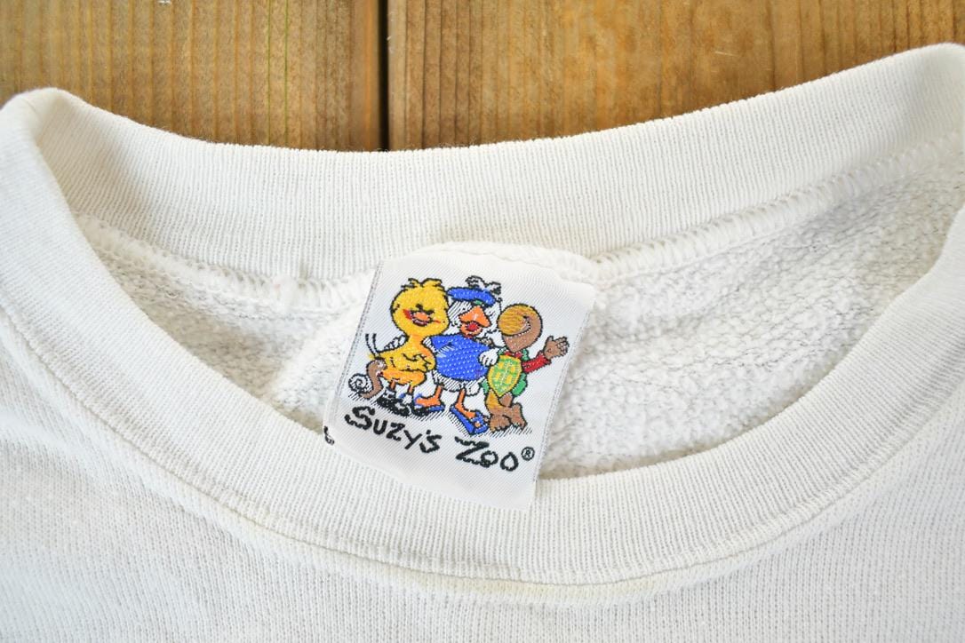 Vintage 1980s Youth Suzy Zoo Walk Don't Run Crewneck Sweatshirt Youth S from propervintagecanada