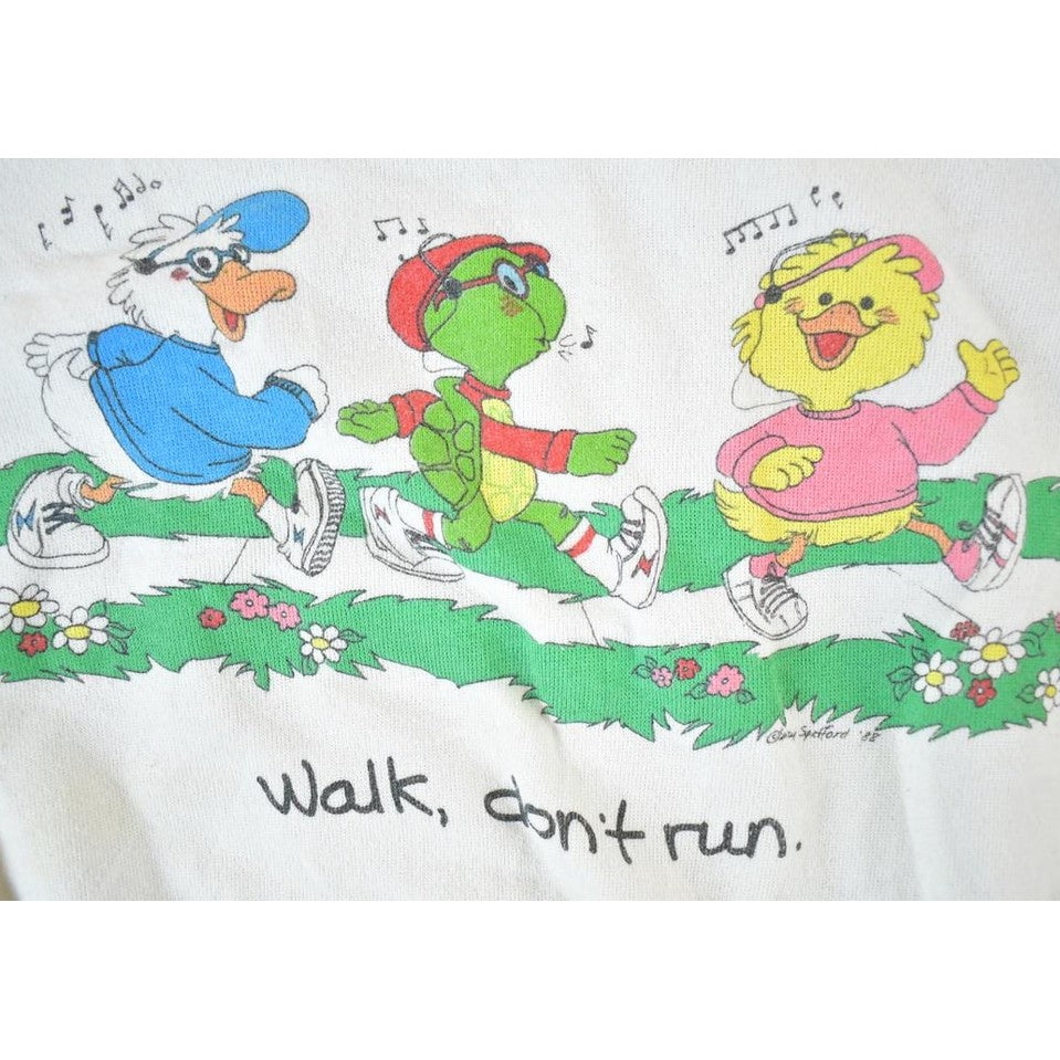 Vintage 1980s Youth Suzy Zoo Walk Don't Run Crewneck Sweatshirt Youth S from propervintagecanada