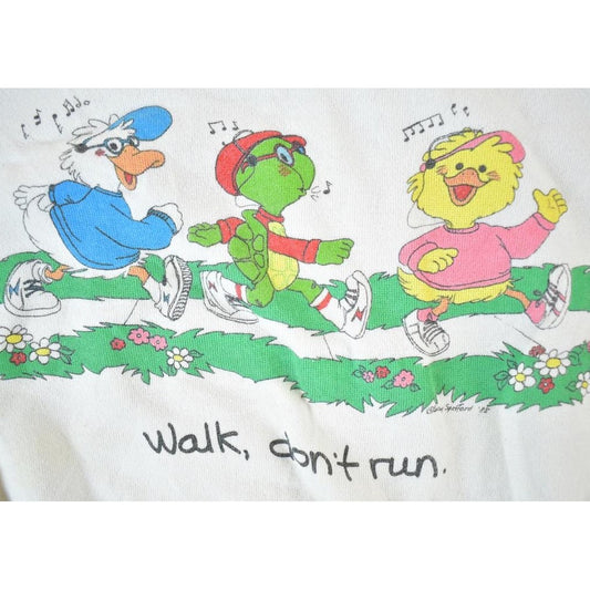Vintage 1980s Youth Suzy Zoo Walk Don't Run Crewneck Sweatshirt Youth S from propervintagecanada