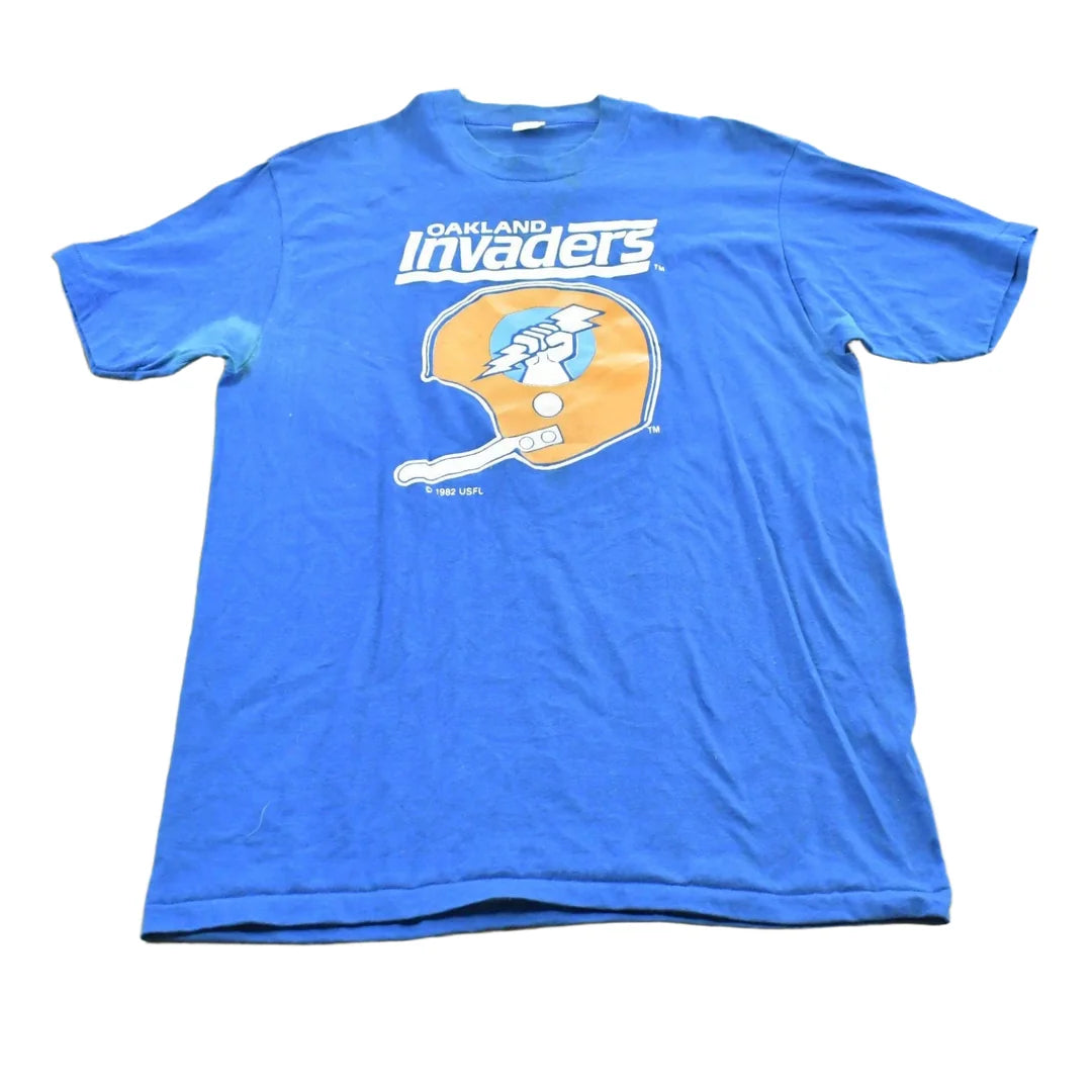 Vintage 1982 Logo 7 USFL Oakland Invaders Football T-Shirt Men M Men's Medium from propervintagecanada