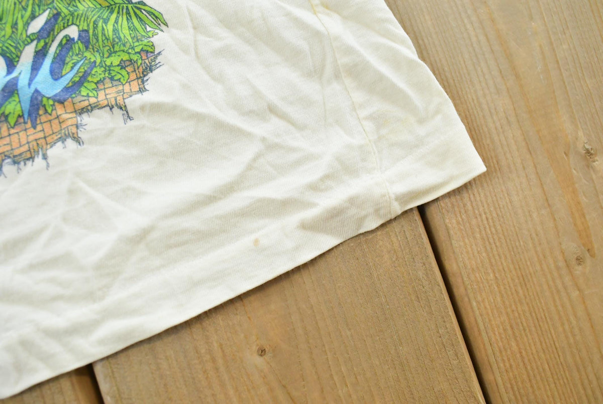 Vintage 1984 Hawaiian Tropic Surfing Tank Top T-Shirt Mens XS from propervintagecanada