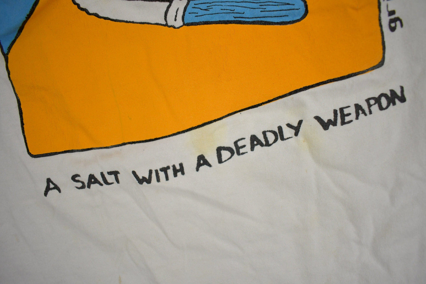 Vintage 1987 " A Salt With A Deadly Weapon" Funny Graphic T Shirt Men's Large from propervintagecanada