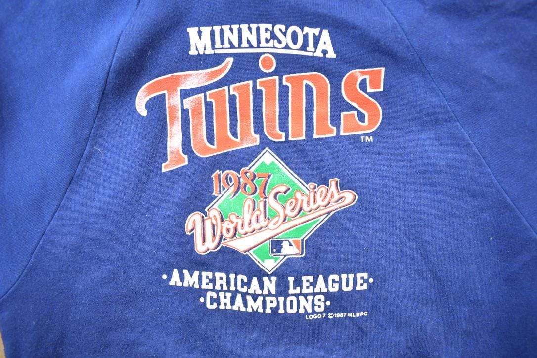 Vintage 1987 Logo 7 Minnesota Twins World Series ALC MLB Hoodie Sweatshirt from propervintagecanada