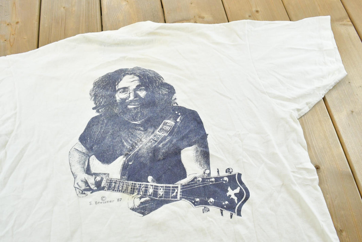 Vintage 1987 The Grateful Dead Steal Your Face Saturn Jerry Garcia Rock Band Concert T-Shirt Mens XL from propervintagecanada