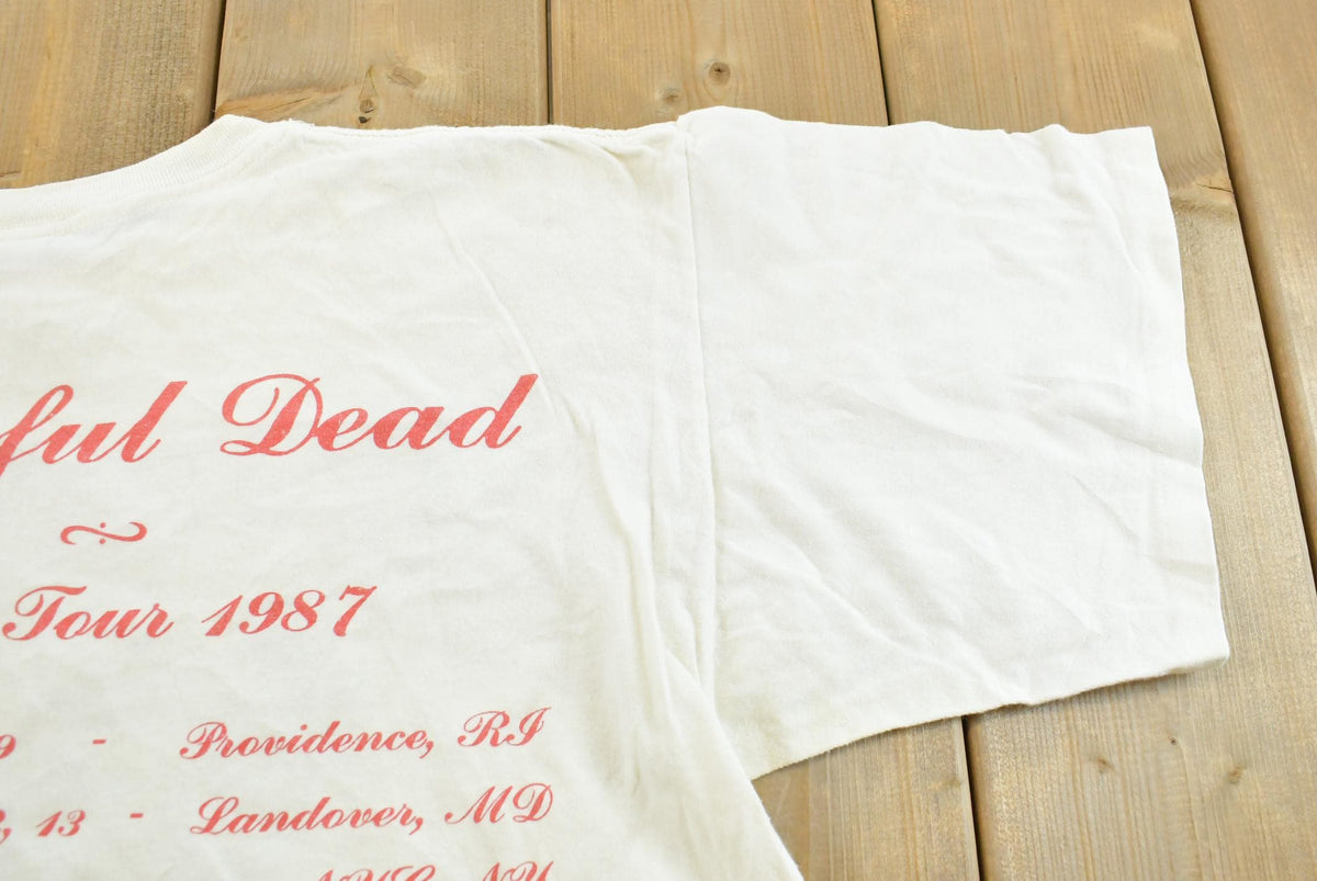 Vintage 1987 The Grateful Dead Touch of Grey Fall Tour Rock Band Concert T-Shirt Men's L from propervintagecanada