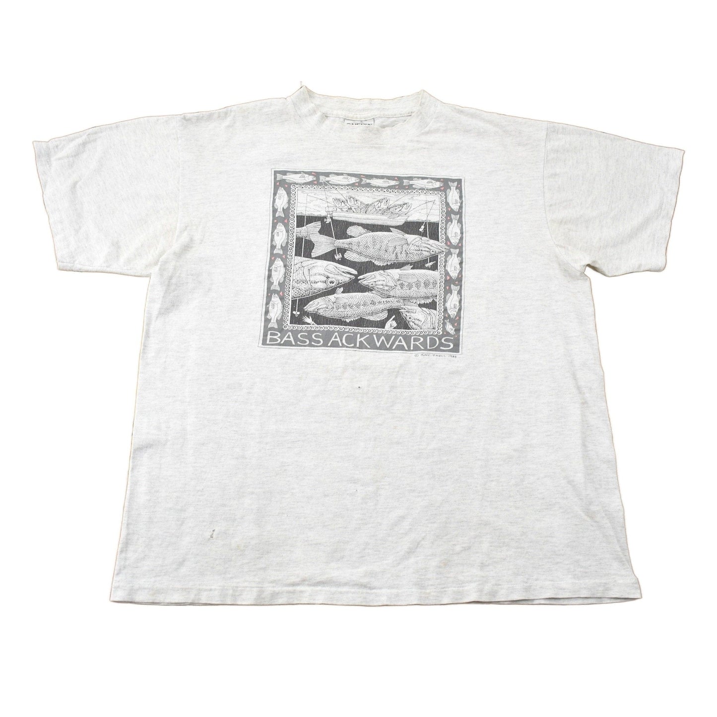 Vintage 1988 Bass Ackwards Fish Ray Troll Graphic T-Shirt Men's Medium from propervintagecanada