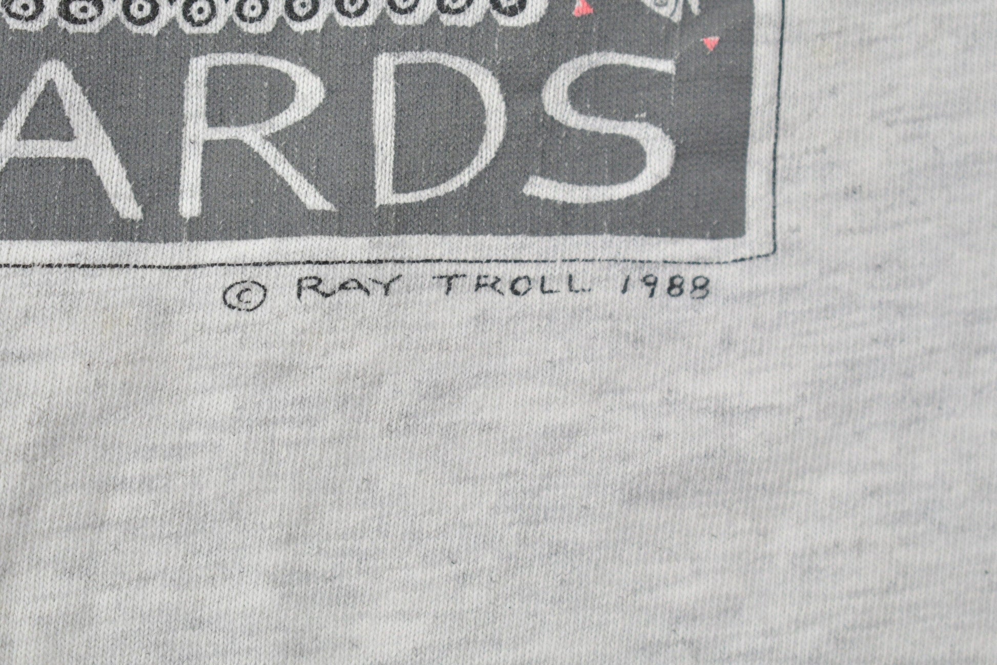 Vintage 1988 Bass Ackwards Fish Ray Troll Graphic T-Shirt Men's Medium from propervintagecanada