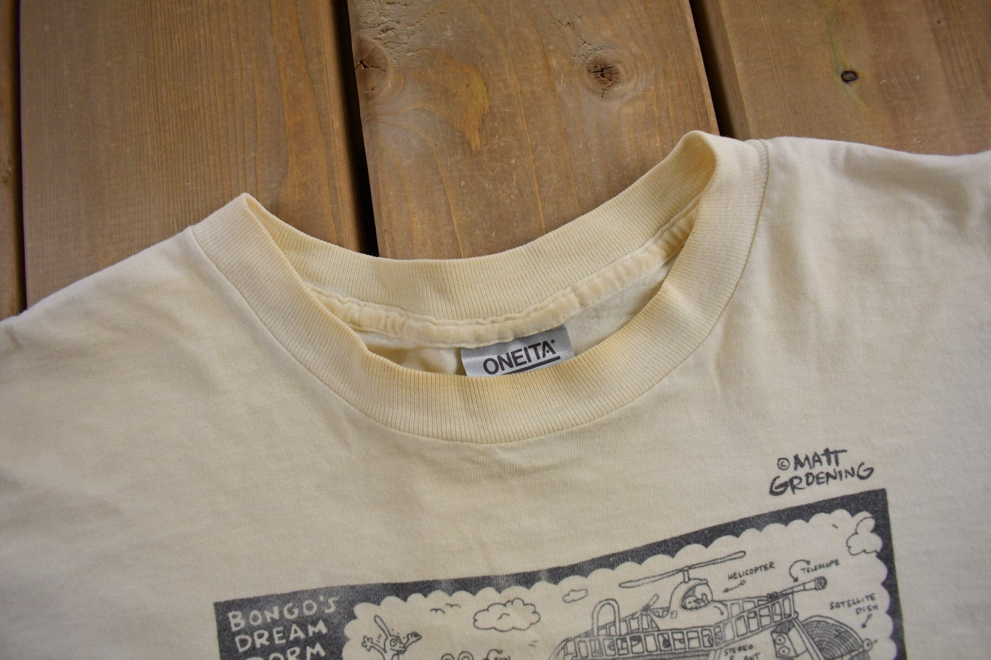 Vintage 1989 Bongo's Dream Dorm Mattt Groening Apple Graphic T-Shirt Men's Large from propervintagecanada