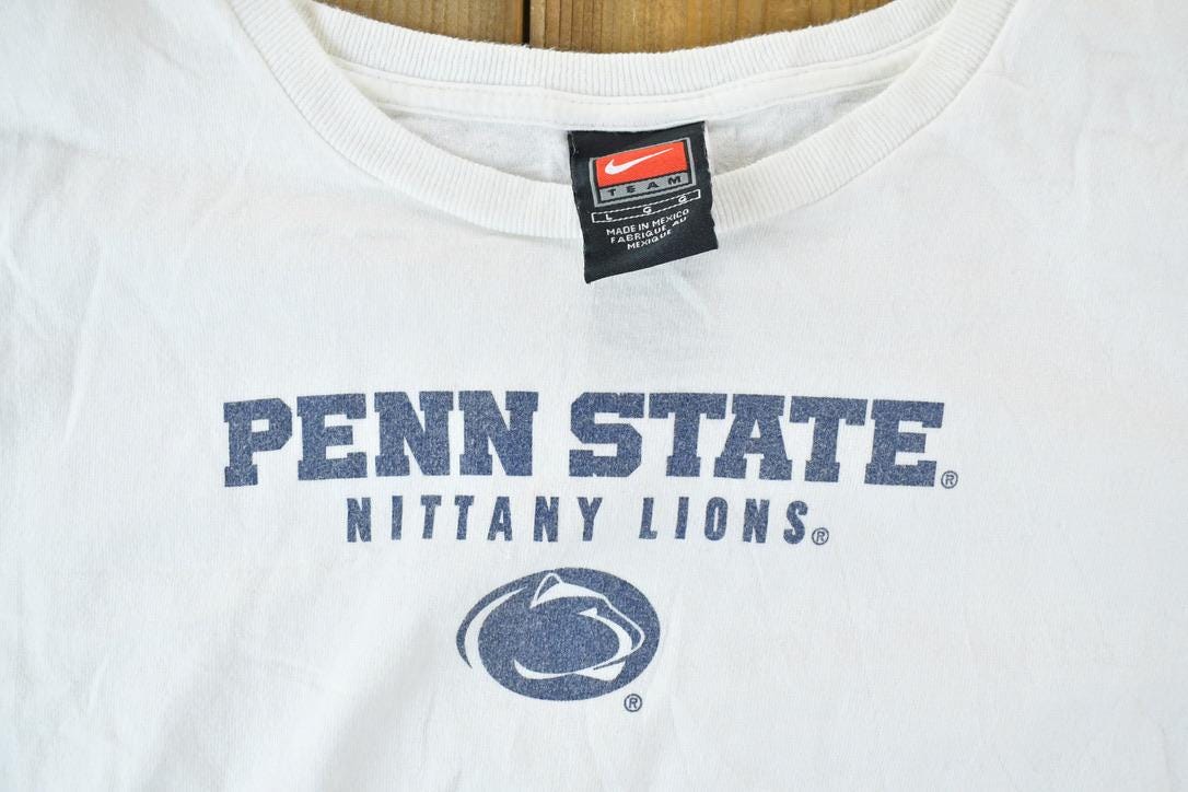 Vintage 1990 Nike Penn State University Collegiate T-Shirt Men's Medium from propervintagecanada