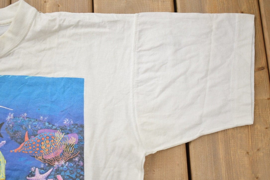 Vintage 1990 Ocean Fishes Theme Bonfire Graphic T-Shirt Single Stitch Men's Large from propervintagecanada