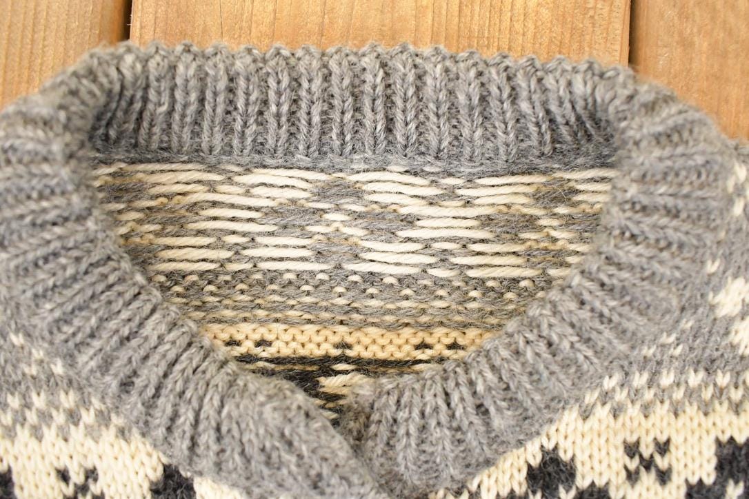 Vintage 1990's Abstract Snowflake Wool Knit Cardigan Sweater Men's S from propervintagecanada