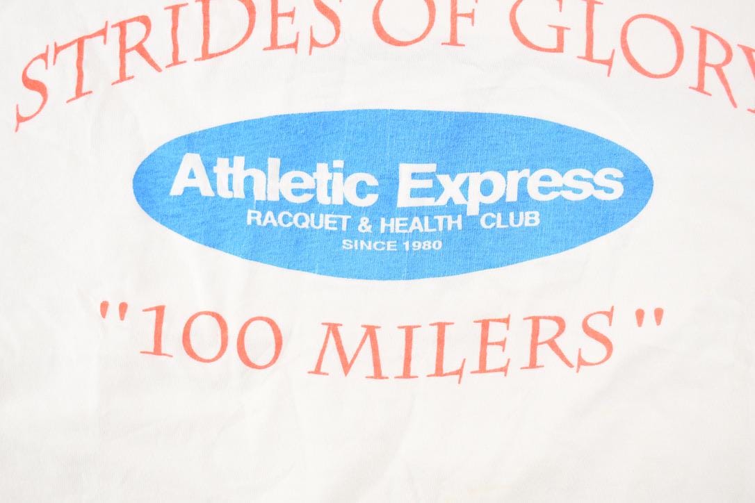 Vintage 1990's Athletic Express Strides Of Glory Souvenir Travel T-Shirt Men's M from propervintagecanada