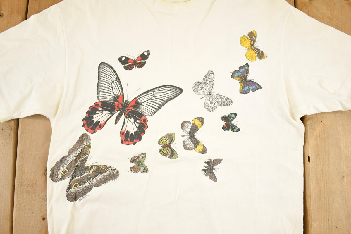 Vintage 1990's Butterfly Family Souvenir Outdoorsman T-Shirt Womens M from propervintagecanada